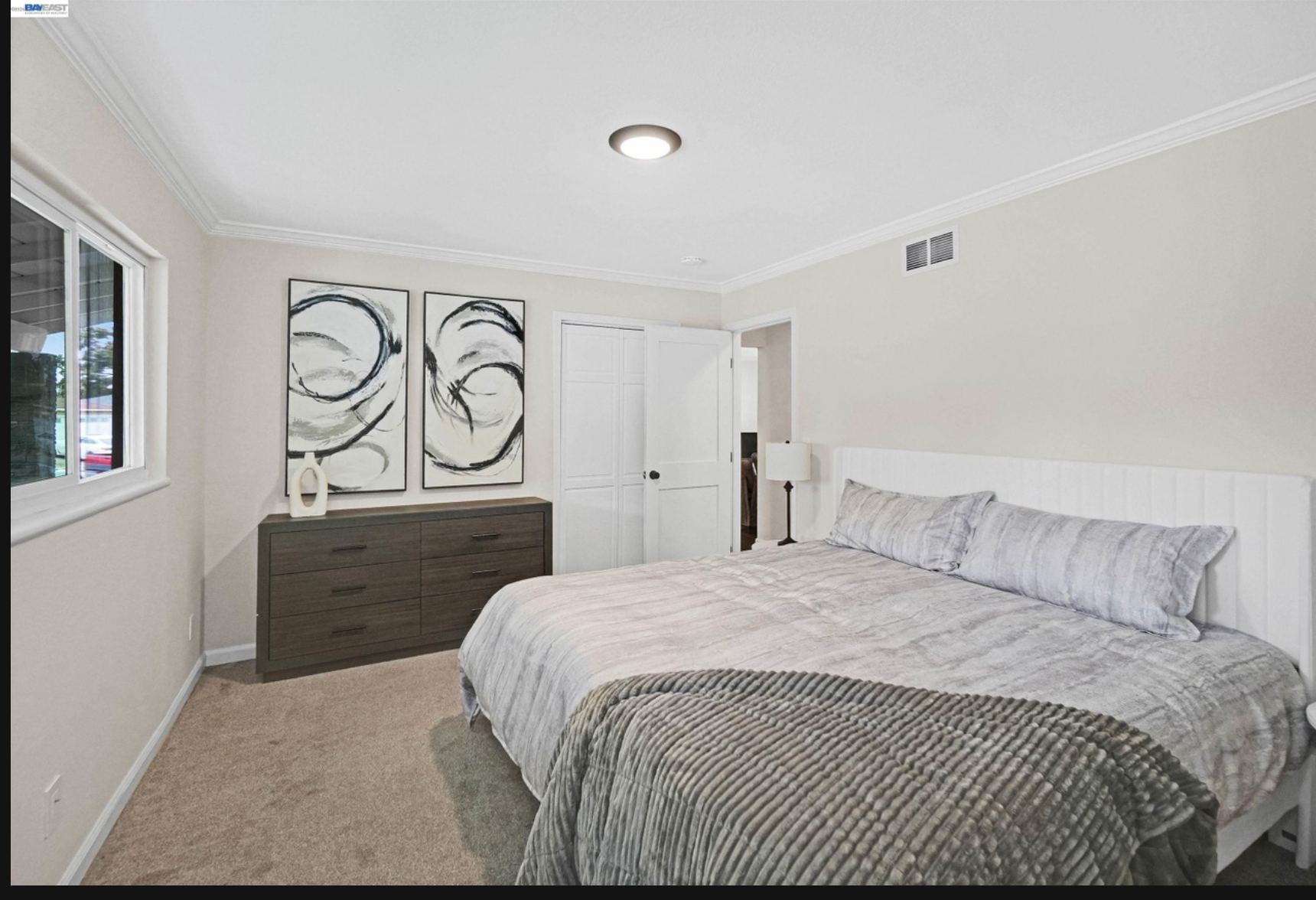 Primary bedroom with king bed