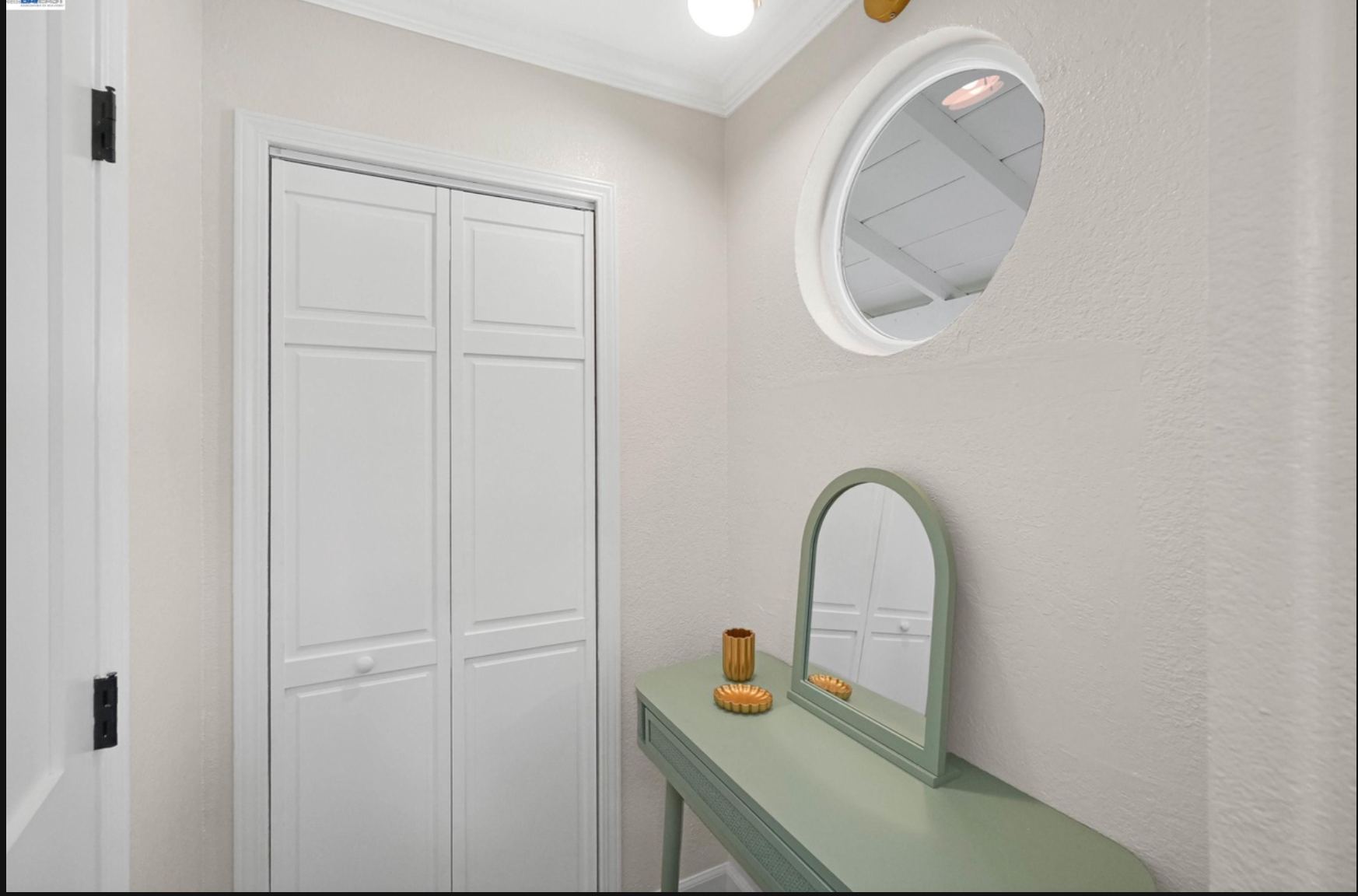 Primary bedroom closet and vanity nook